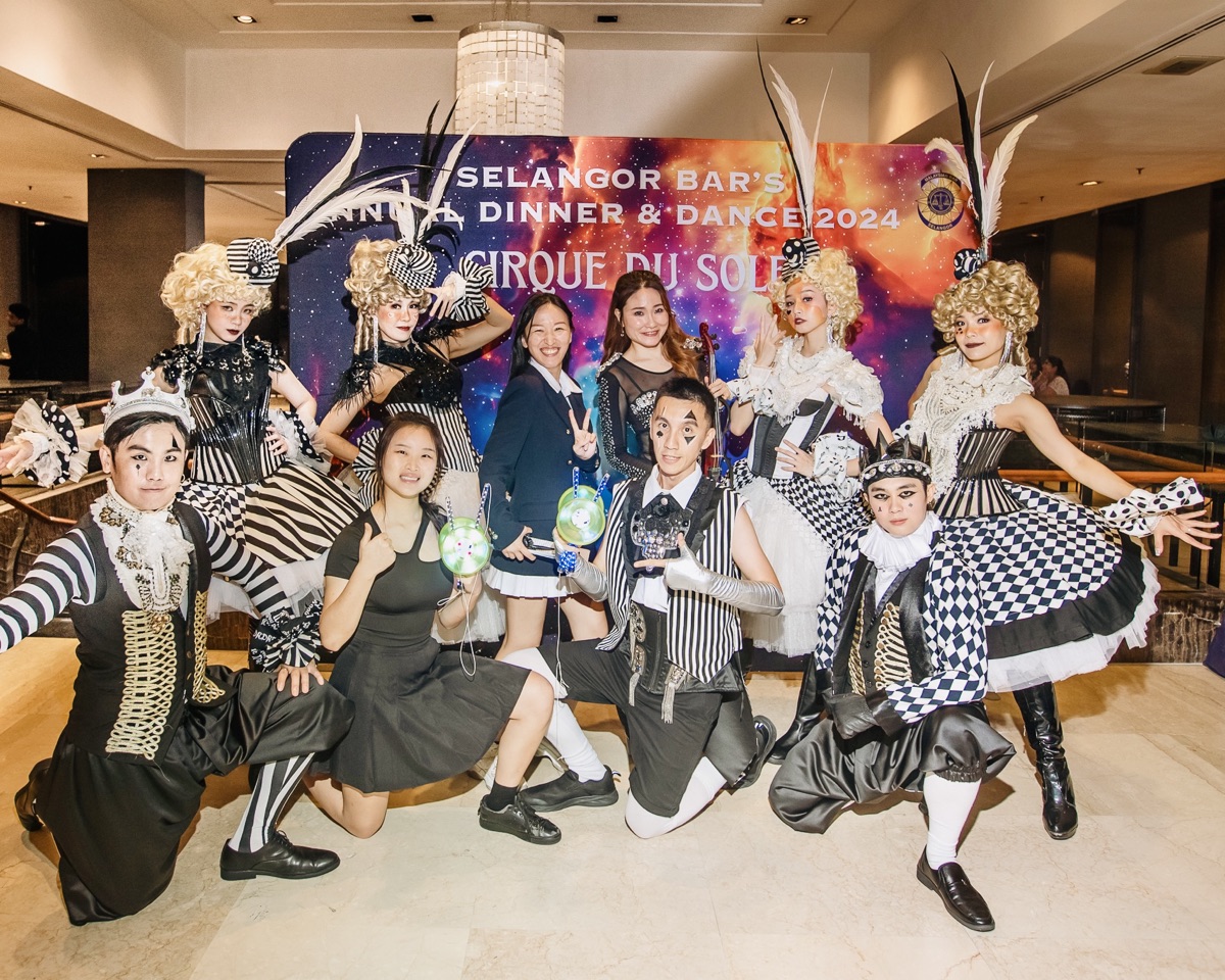 Harlequin costumed performers with guests at the Selangor Bar annual dinner and dance 2024