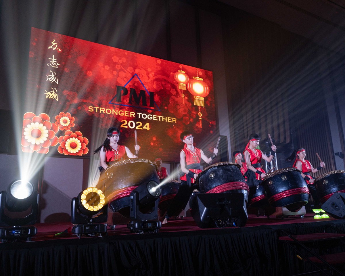 Drummers performing on stage at the PMI Stronger Together 2024 dinner