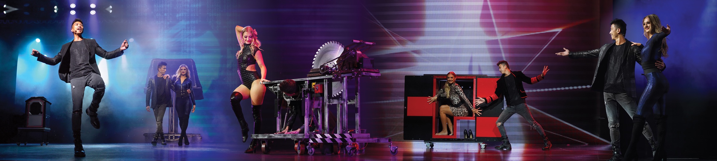 The MADgicians on stage, from grand illusions and the saw to the box act