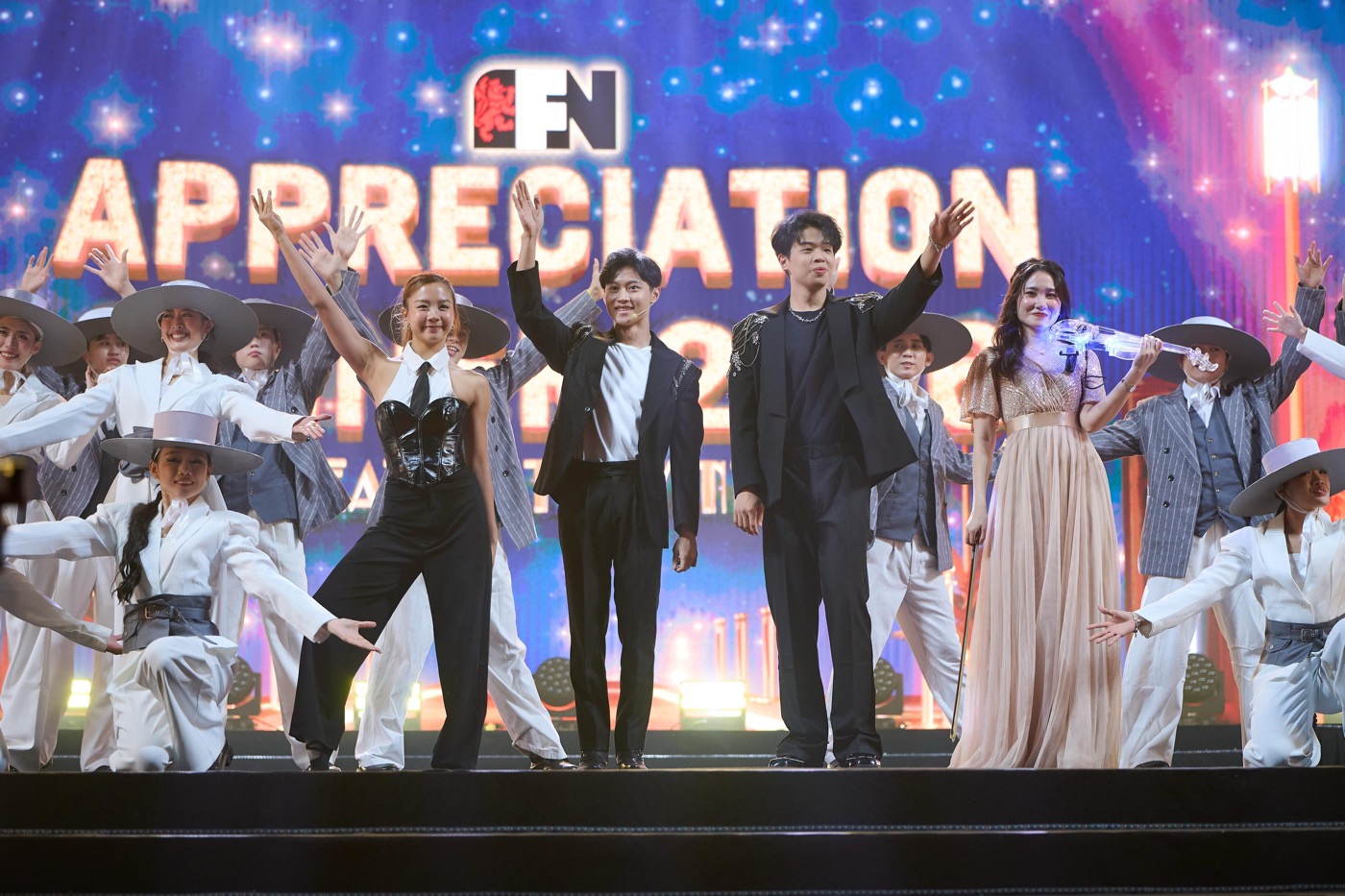 The MADgicians on stage with the cast at the F&N appreciation night